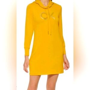 NEVER WORN CALVIN KLEIN PULL OVER WINTER DRESS. SIZE. L